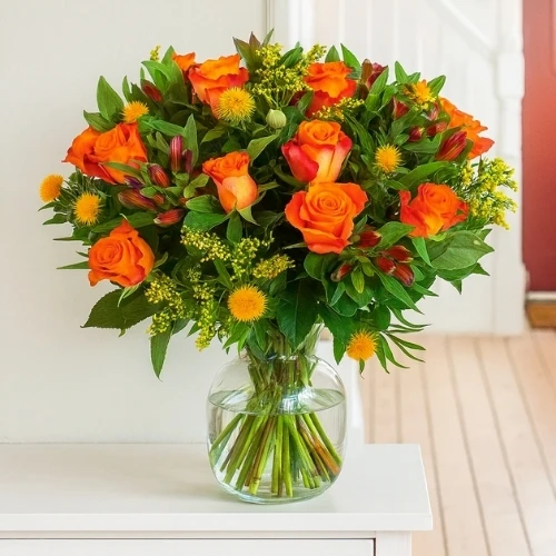 Oranje rozen en bloemen