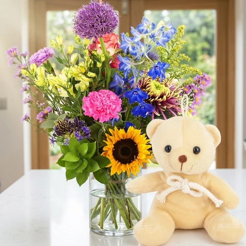 Geplukte bloemen + knuffelbeertje